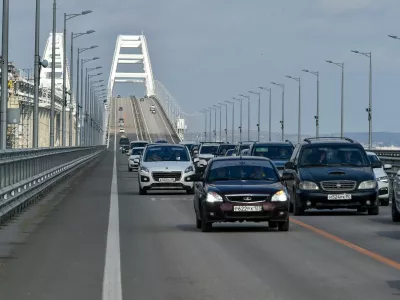 FILE - Cars and other vehicles drive on the Kerch&nbsp;Bridge connecting the Russian mainland and the Crimean&nbsp;Peninsula on&nbsp;Thursday, Feb. 23, 2023. &nbsp;(AP Photo, File)