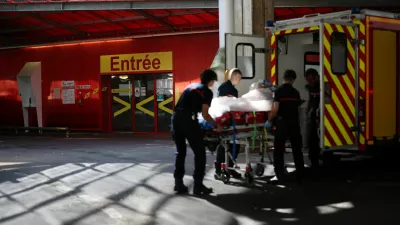 French firefighters arrive with a patient on a stretcher at the Emergency Department of the ​​Nantes CHU Hospital in Nantes, France, June 26, 2026. REUTERS/Stephane Mahe