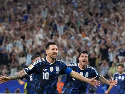Argentina's Lionel Messi (10) celebrates scoring his side's 3rd goal during the World Cup Group J soccer match between Jordan and Argentina in Arlington, Texas, near Dallas, Saturday, June 27, 2026. (AP Photo/Tony Gutierrez)