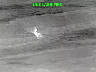 A drone footage shows fire and smoke rising, after what the U.S. Central Command said, were strikes on Iran targeting various sites in response to continued Iranian aggression against commercial shipping, at an unknown location in this screengrab from a hadout video released on June 27, 2026. U.S. Central Command/Handout via REUTERS. THIS IMAGE HAS BEEN SUPPLIED BY A THIRD PARTY. MANDATORY CREDIT. TEXT OVERLAY FROM SOURCE. VERIFICATION: - Location and date could not be verified - No earlier version of the video found posted online before Saturday, June 27