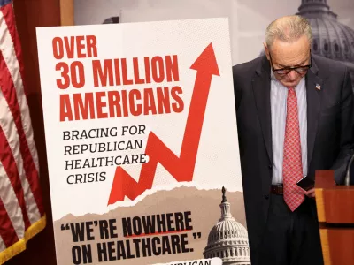 U.S. Senate Democratic Leader Chuck Schumer looks down during a news conference following Senate votes on competing healthcare plans, at the U.S. Capitol in Washington, D.C., U.S., December 11, 2025. REUTERS/Kevin Lamarque