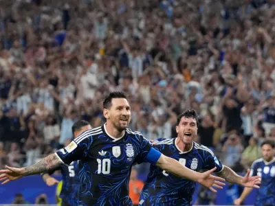 Argentina's Lionel Messi (10) celebrates scoring his side's 3rd goal during the World Cup Group J soccer match between Jordan and Argentina in Arlington, Texas, near Dallas, Saturday, June 27, 2026. (AP Photo/Tony Gutierrez)