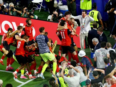 Soccer Football - FIFA World Cup 2026 - Group J - Algeria v Austria - Kansas City Stadium, Kansas City, Missouri, U.S. - June 27, 2026 Austria's Sasa Kalajdzic celebrates scoring their third goal with teammates REUTERS/Pedro Nunes REFILE - CORRECTING INFORMATION