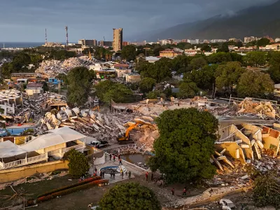 This aerial view shows destroyed buildings in Caraballeda, La Guaira State, Venezuela, on Monday, June 29, 2026, following two major earthquakes. (Miguel Medina/Pool Photo via AP)