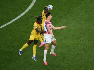 Croatia's Igor Matanovic (20) battles for a header with Ghana's Derrick Luckassen (23) during the World Cup Group L soccer match between Croatia and Ghana in Philadelphia, Saturday, June 27, 2026. (AP Photo/Matt Rourke)