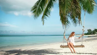 Beautiful Woman Swinging on a Tropical Beach,Image: 306318104, License: Royalty-free, Restrictions:, Model Release: yes 