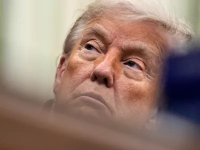 FILE PHOTO: U.S. President Donald Trump looks on as he sits in the Oval Office of the White House in Washington, D.C., U.S., June 26, 2026. REUTERS/Ken Cedeno/File Photo