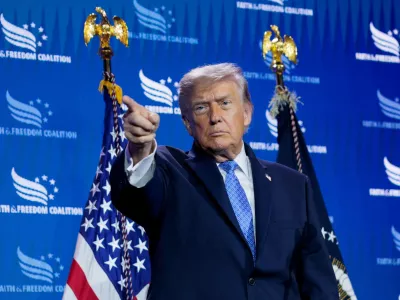 FILE PHOTO: U.S. President Donald Trump points his finger during the Faith & Freedom Coalition's 2026 Policy Conference at the Washington Hilton, in Washington, D.C., U.S., June 26, 2026. REUTERS/Evan Vucci/File Photo