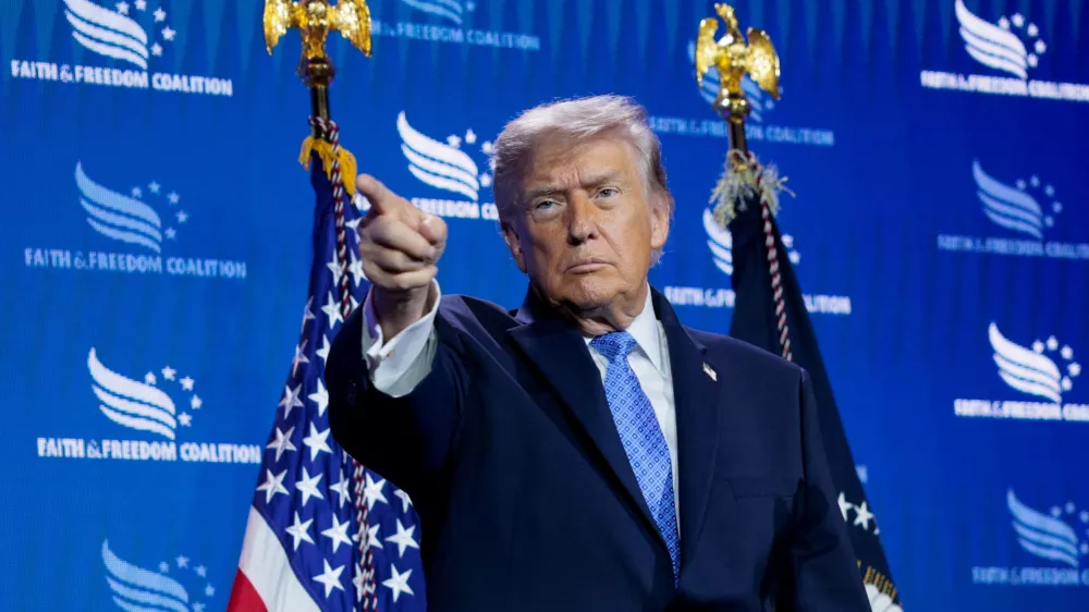 FILE PHOTO: U.S. President Donald Trump points his finger during the Faith & Freedom Coalition's 2026 Policy Conference at the Washington Hilton, in Washington, D.C., U.S., June 26, 2026. REUTERS/Evan Vucci/File Photo