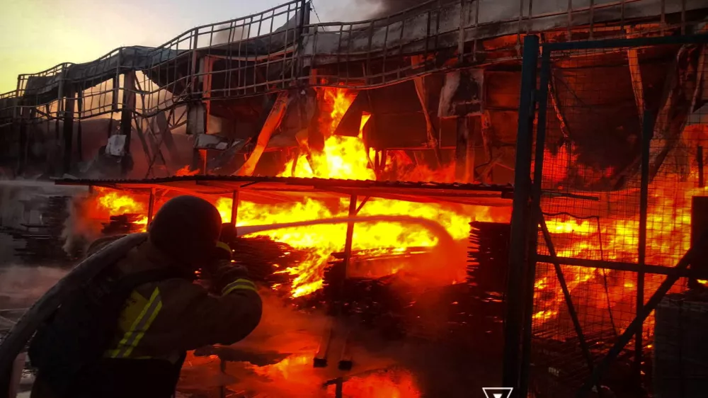 A firefighter works at the site of a mall holding household products hit during an overnight Russian drone strikes in the town of Snihurivka, amid Russia's attack on Ukraine, in Mykolaiv region, Ukraine July 1, 2026. Press service of the State Emergency Service of Ukraine in Mykolaiv region/Handout via REUTERS ATTENTION EDITORS - THIS IMAGE HAS BEEN SUPPLIED BY A THIRD PARTY. DO NOT OBSCURE LOGO.