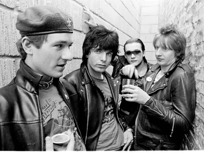 Captain Sensible (aka Raymond Burns), Brian James, Dave Vanian and Rat Scabies of punk band The Damned pose for a group portrait in Spring 1977 in Copenhagen, Denmark. (Photo by Jorgen Angel/Redferns)