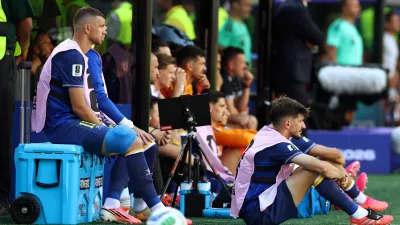 Soccer Football - FIFA World Cup 2026 - Round of 32 - United States v Bosnia and Herzegovina - San Francisco Bay Area Stadium, Santa Clara, California, U.S. - July 1, 2026 Bosnia and Herzegovina's Edin Dzeko sits with ice on his leg after being substituted REUTERS/Phil Noble
