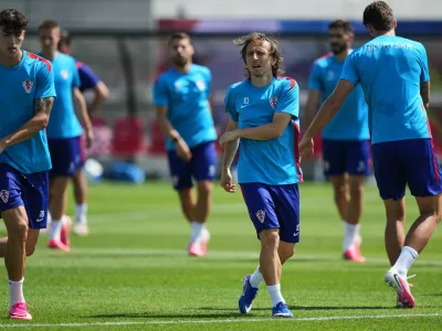 Croatia's Luka Modric, second from right, works out, during a training session on the eve of the team's World Cup soccer match against Portugal, Wednesday, July 1, 2026, in Toronto, Canada. (AP Photo/Stephanie Scarbrough)