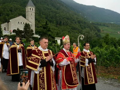 Monsignor Alfonso de Galarreta, center, arrives in procession for a consecration ceremony for four new bishops at the Society of St. Pius X seminary in Econe, Switzerland, Wednesday, July 1, 2026. (AP Photo/Baz Ratner)