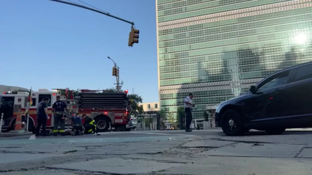 Emergency responders attend to a man identified by Voice of Tibet, a media outlet of exiled Tibetans, as Tibetan activist Lobga Rangzen, after he set himself on fire in an appeal for Tibetan independence, near the United Nations headquarters, in New York, U.S, July 2, 2026 in this still image obtained from social media video. Lobga Rangzen via Facebook/via REUTERS THIS IMAGE HAS BEEN SUPPLIED BY A THIRD PARTY. MANDATORY CREDIT. NO RESALES. NO ARCHIVES. NEWS USE ONLY. VERIFICATION - Building, utility poles and road layout matched archive and satellite images. - Date confirmed by original video livestream. - Identity of the activist confirmed as Lobga Rangzen by Voice of Tibet. - Police in New York City said on Thursday a man died from severe burns near the United Nations headquarters.
