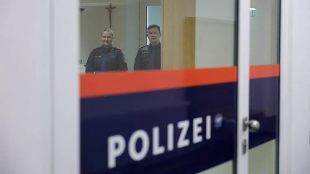 Police officers stand inside the building where Adolf Hitler was born, which has been converted into a police station by Austria's government in hopes of preventing it from serving as a place of pilgrimage for neo-Nazis, in Braunau am Inn, Austria, July 22, 2026. REUTERS/Gintare Karpaviciute