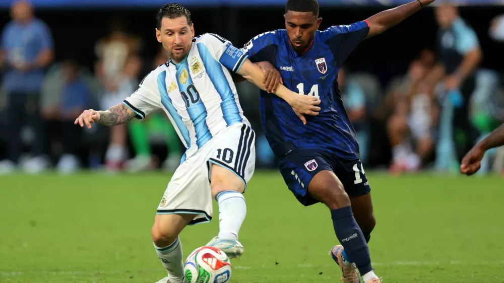 Soccer Football - FIFA World Cup 2026 - Round of 32 - Argentina v Cape Verde - Miami Stadium, Miami Gardens, Florida, U.S. - July 3, 2026 Argentina's Lionel Messi in action with Cape Verde's Deroy Duarte IMAGN IMAGES via Reuters/Sam Navarro