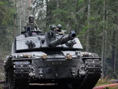 Pictured are The Queens Royal Hussars (QRH), Challenger 2s, about to breach Abatus, an obstacle formed from felled trees during a training exercise.This type of obstacle is designed to slow and even halt advancing vehicles. The Queens Royal Hussars (QRH), eFP BG operated the Challenger two's and navigated the obstructions with ease whilst deployed on Operation CABRIT in Estonia as part of the NATO enhanced Forward Presence. The Challenger 2 is a main battle tank, designed to destroy other tanks. It has been used by the British Army on operations in Bosnia and Herzegovina, Kosovo and Iraq, and has never experienced a loss at the hands of the enemy. Built in the UK by Vickers Defence Systems, now BAE Systems and Land Armaments, it was designed as a replacement to the Challenger 1 tank in 1986 and has been in service with the British Army since July 1994.