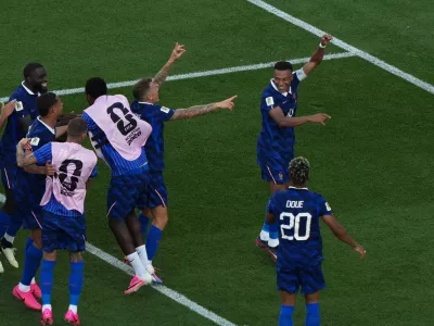 France's Kylian Mbappe, right, and his teammates celebrate after the World Cup round of 16 soccer match against Paraguay in Philadelphia, Saturday, July 4, 2026. (AP Photo/Matt Rourke)