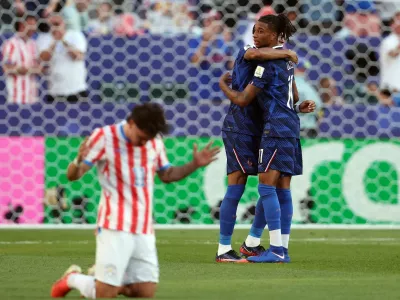 Soccer Football - FIFA World Cup 2026 - Round of 16 - Paraguay v France - Philadelphia Stadium, Philadelphia, Pennsylvania, U.S. - July 4, 2026 France's Michael Olise and Kylian Mbappe celebrate after the match IMAGN IMAGES via Reuters/Bill Streicher