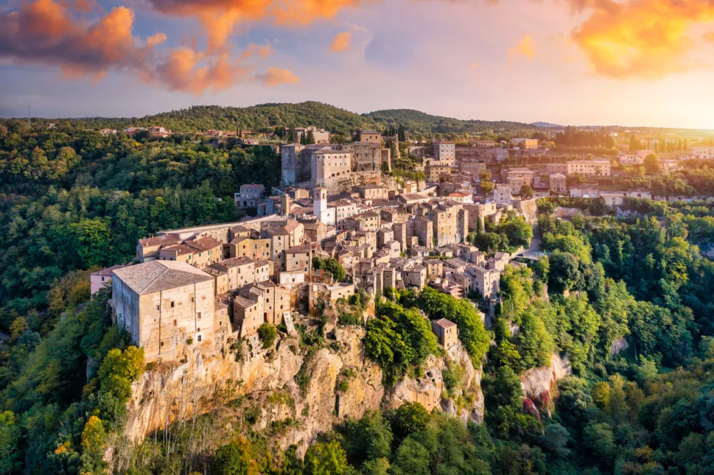 Medieval Pitigliano town over tuff rocks in province of Grosseto, Tuscany, Italy. Pitigliano is a small medieval town in southern Tuscany, Italy.