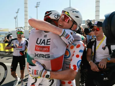 Cycling - Tour de France - Stage 2 - Barcelona to Tarragona - Barcelona, Spain - July 5, 2026 UAE Team Emirates XRG's Isaac Del Toro celebrates after winning stage 2 with UAE Team Emirates XRG's Tadej Pogacar REUTERS/Stephanie Lecocq/Pool