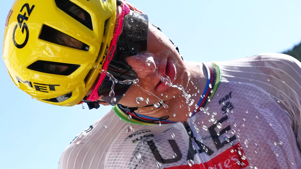 Slovenia's Tadej Pogacar drinks after winning the third stage of the Tour de France cycling race with start in Granollers and finish in Les Angles, France, Monday, July 6, 2026. (Anne-Christine Poujoulat/Pool Photo via AP)