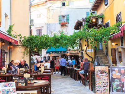 Porec, Croatia - July, 14: View of restaurants, pubs and bars in the center town on July 14, 2017