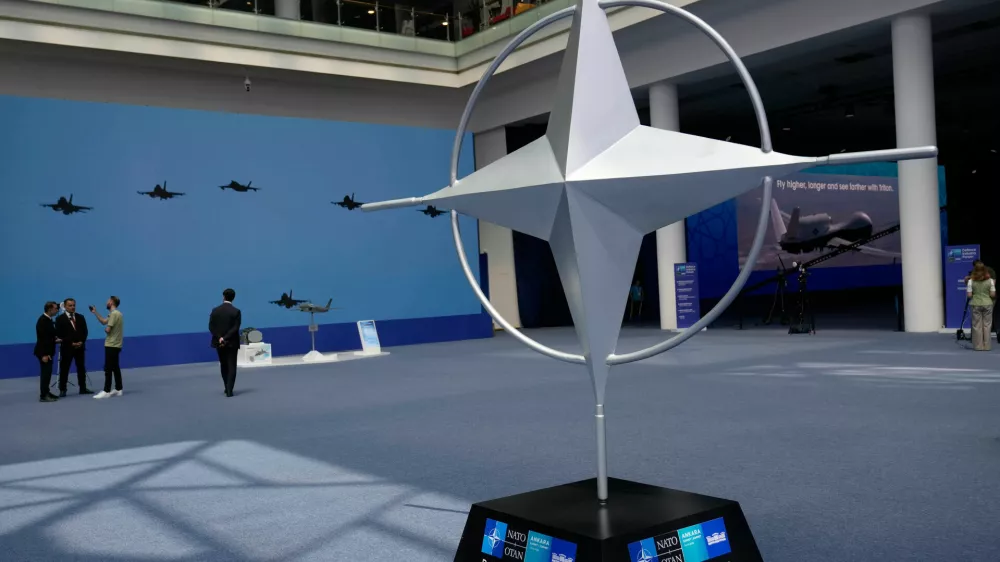 Participants view displays during the NATO Defense Industry Forum at the NATO summit in Ankara, Turkey, Tuesday, July 7, 2026. (AP Photo/Hussein Malla)