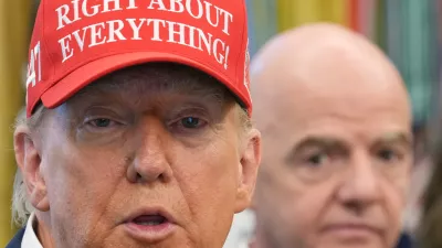 FILE - President Donald Trump speaks as FIFA President Gianni Infantino listens in the Oval Office of the White House, Friday, Aug. 22, 2025, in Washington. (AP Photo/Jacquelyn Martin, File)