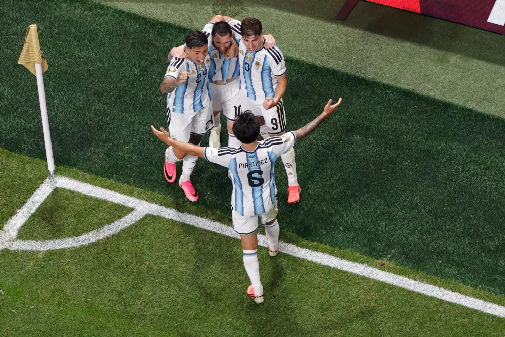 Argentina's Lionel Messi celebrates with his teammates after scoring his side's second goal during the World Cup round of 16 soccer match between Argentina and Egypt in Atlanta, Tuesday, July 7, 2026. (AP Photo/Butch Dill)