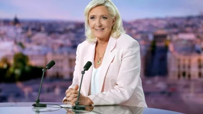 FILE PHOTO: French far-right leader Marine Le Pen, member of parliament for the Rassemblement National (National Rally - RN) party, poses prior to an interview on the evening news broadcast of French TV channel TF1, following the verdict in her appeal trial over misuse of EU funds, in Boulogne-Billancourt, near Paris, France, July 7, 2026. REUTERS/Christian Hartmann/Pool   TPX IMAGES OF THE DAY/File Photo