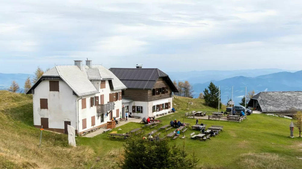 Urslja Peak / Slovenia - October 10 2020: Mountain hut on Urslja gora or Plesivec in the Koroska region of Slovenia on a summer day.