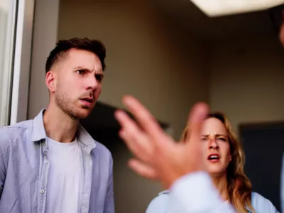 Angry dispute interrupts young woman's peaceful visit, revealing tension between neighbors quarreling over a living situation.