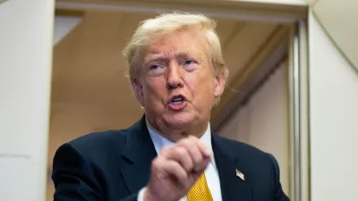 President Donald Trump speaks with reporters in flight on Air Force One after landing at U.S. Air Force Base at RAF Mildenhall, in Suffolk, Eastern England, Wednesday, July 8, 2026. (AP Photo/Alex Brandon)