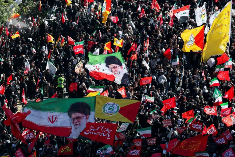 Mourners gather on the day of the burial of Iran's late Supreme Leader Ayatollah Ali Khamenei, who was killed on February 28 in Israeli and U.S. airstrikes, in a culmination of a mass funeral, in Mashhad, Iran, July 9, 2026. REUTERS/Mohammed Salem Foreign media in Iran operate under guidelines set by the Ministry of Culture and Islamic Guidance, which regulates press activity and permissions.  ISRAEL OUT. NO COMMERCIAL OR EDITORIAL SALES IN ISRAEL. NO ACCESS FOR ISRAELI MEDIA. NO USE BBC PERSIAN. NO USE VOA PERSIAN. NO USE MANOTO. NO USE IRAN INTERNATIONAL. NO USE RADIO FARDA. DIGITAL: NO USE BBC PERSIAN. NO USE VOA PERSIAN. NO USE MANOTO. NO USE IRAN INTERNATIONAL. NO USE RADIO FARDA.