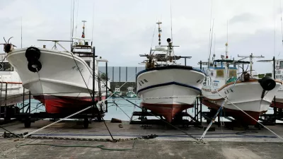 Fishing boats are tied to a pier as Typhoon Bavi approaches, in Ishigaki, Japan, July 9, 2026. REUTERS/Kim Kyung-Hoon