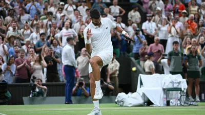 Tennis - Wimbledon - All England Lawn Tennis and Croquet Club, London, Britain - July 7, 2026 Serbia's Novak Djokovic celebrates after winning his quarter final match against Canada's Felix Auger-Aliassime REUTERS/Jaimi Joy