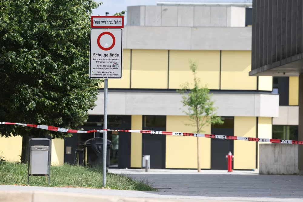 Police tape cordoning off Welfen High School, Schongau, Germany, Wednesday, July 8, 2026. (Karl-Josef Hildenbrand/dpa via AP)