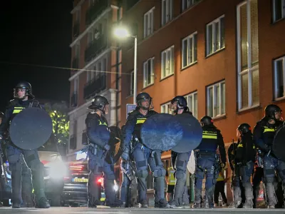 Dutch riot police deploys as Morocco fans gather after the World Cup quarterfinal soccer match between France and Morocco in The Hague, Netherlands, Friday, July 10, 2026. (AP Photo/Mouneb Taim)
