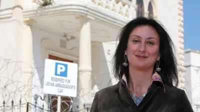 Maltese investigative journalist Daphne Caruana Galizia poses outside the Libyan Embassy in Valletta April 6, 2011. Investigative journalist Caruana Galizia was killed after a powerful bomb blew up a car killing her in Bidnija, Malta, in October 16, 2017. Picture taken April 6, 2011. REUTERS/Darrin Zammit Lupi - RC11D8CC39E0