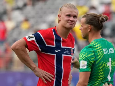 Norway's Erling Haaland (9) and Norway goalkeeper Oerjan Nyland (1) celebrate after the World Cup round of 16 soccer match between Brazil and Norway in East Rutherford, N.J., near New York, Sunday, July 5, 2026. (AP Photo/Frank Franklin II)