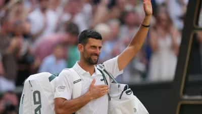Novak Djokovic of Serbia leaves after losing to Jannik Sinner of Italy in their men's singles semifinal match at the Wimbledon Tennis Championships in London, Friday, July 10, 2026. (AP Photo/Kin Cheung)