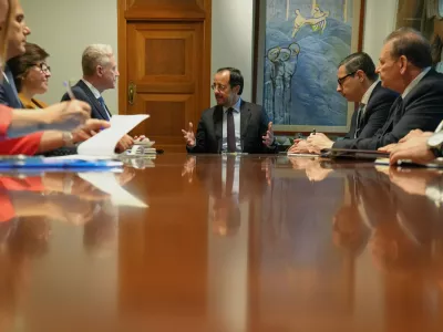 Lebanese Prime Minister Youssef Rajji, rear left, Cyprus President Nikos Christodoulides, center, and Cypriot Foreign Minister Constantinos Kombos, rear right, speak during a meeting at the Presidential Palace in Nicosia, Cyprus, Thursday, July 9, 2026. (AP Photo/Petros Karadjias)