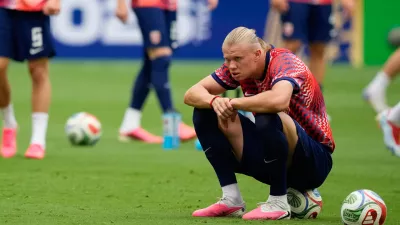 Norway's Erling Haaland sits on a ball during warmup before the World Cup quarterfinal soccer match between Norway and England in Miami Gardens, Fla., Saturday, July 11, 2026. (AP Photo/Rebecca Blackwell)