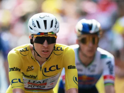 Cycling - Tour de France - Stage 9 - Malemort to Ussel - USSEL, France - July 12, 2026 UAE Team Emirates - XRG's Tadej Pogacar wearing the yellow jersey during the finish of stage 9 REUTERS/Stephanie Lecocq