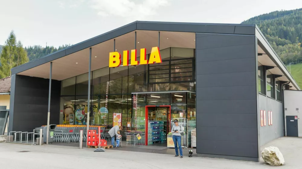 People visit Billa supermarket. Haus village is a small winter resort located in Styria, Austria.