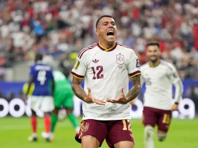 Spain's Pedro Porro reacts after scoring his side's second goal during the World Cup semifinal soccer match between France and Spain in Arlington, Texas, near Dallas, Tuesday, July 14, 2026. (AP Photo/Ashley Landis)