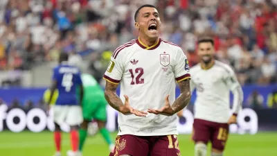 Spain's Pedro Porro reacts after scoring his side's second goal during the World Cup semifinal soccer match between France and Spain in Arlington, Texas, near Dallas, Tuesday, July 14, 2026. (AP Photo/Ashley Landis)