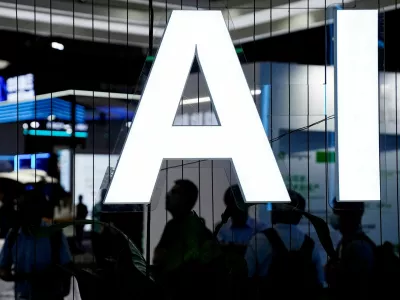 FILE PHOTO: An AI sign is seen at the World Artificial Intelligence Conference in Shanghai, China July 6, 2023. REUTERS/Aly Song/File Photo